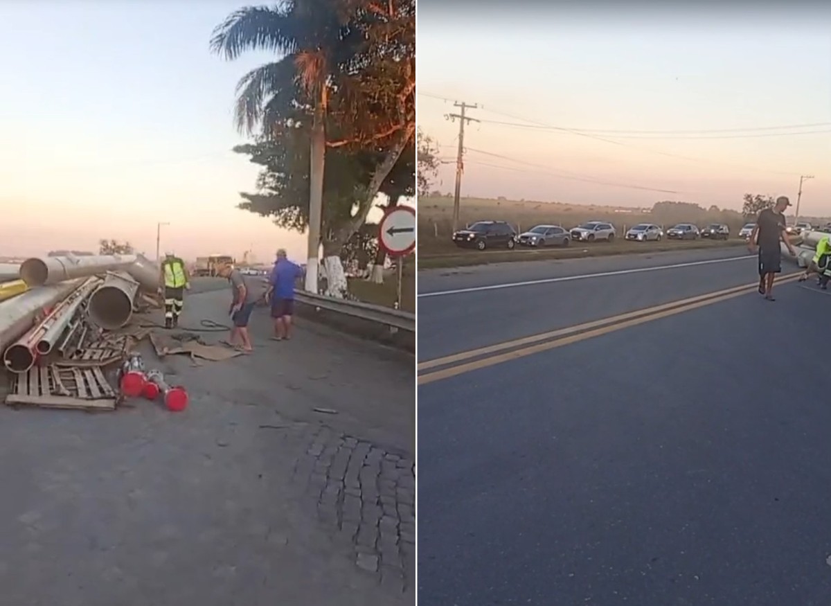Carreta tomba na BR-101 e espalha carga de tubos pela rodovia em Campos, no RJ